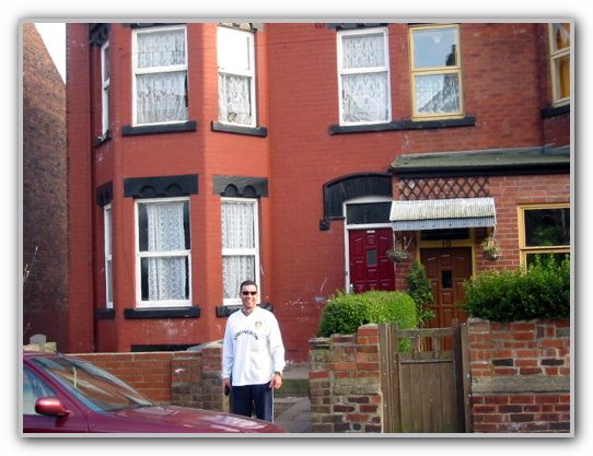Charles outside 12 Avenue Crescent